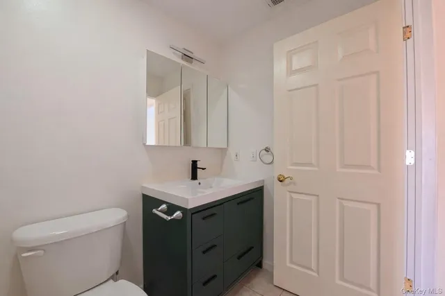 a view of a bathroom from the hallway