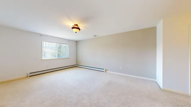 a bathroom with a sink and a window