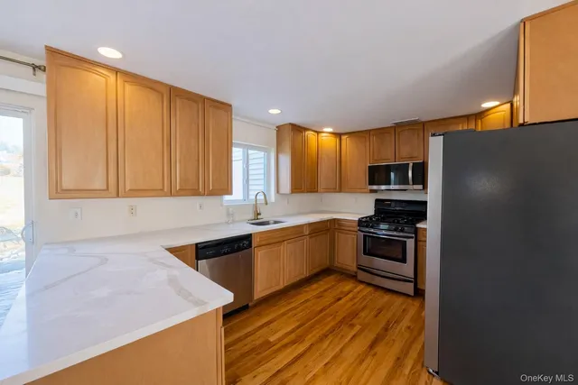 a view of a house with wooden floor
