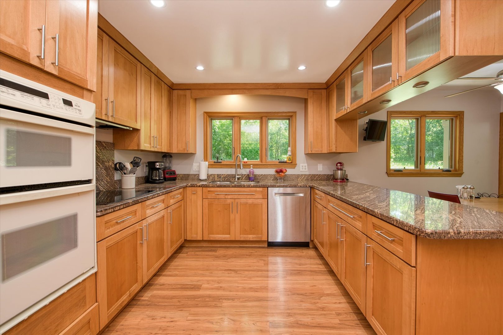 1196 Nottingham Lane Elgin, IL 60120 - Photo 13 of 45 a kitchen with stainless steel appliances granite countertop a stove a sink dishwasher and a refrigerator