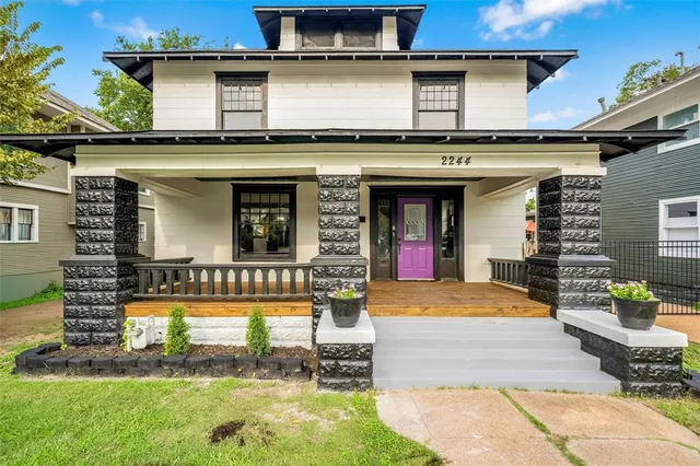 a front view of a house with swimming pool