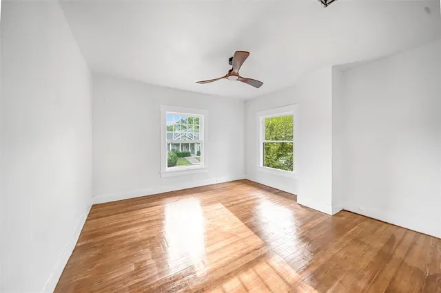 a view of empty room with windows