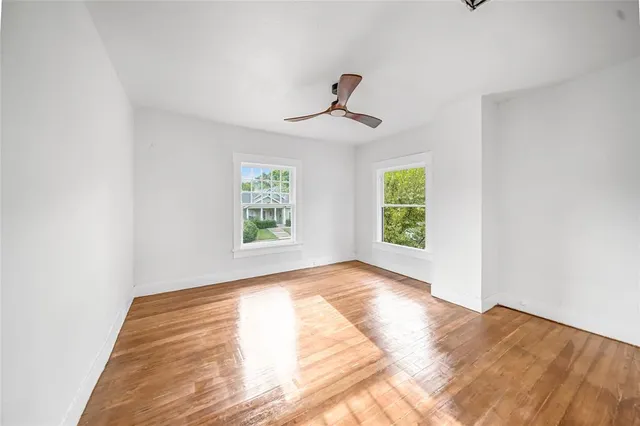 a view of empty room with windows