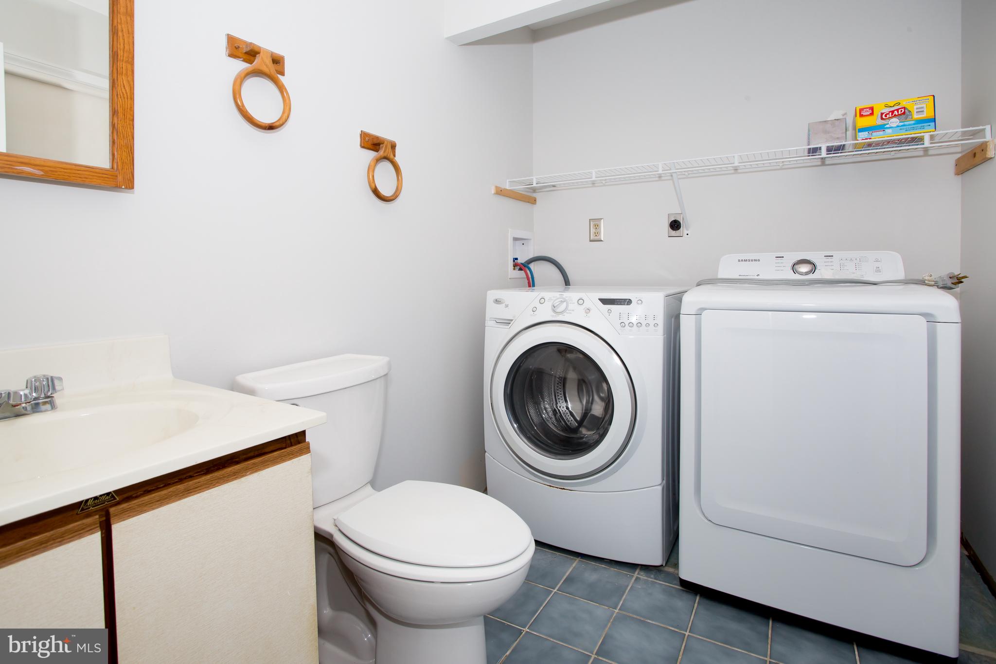 264 Rushes Drive Bear, DE 19701 - Photo 7 of 25 Main floor laundry & half bath