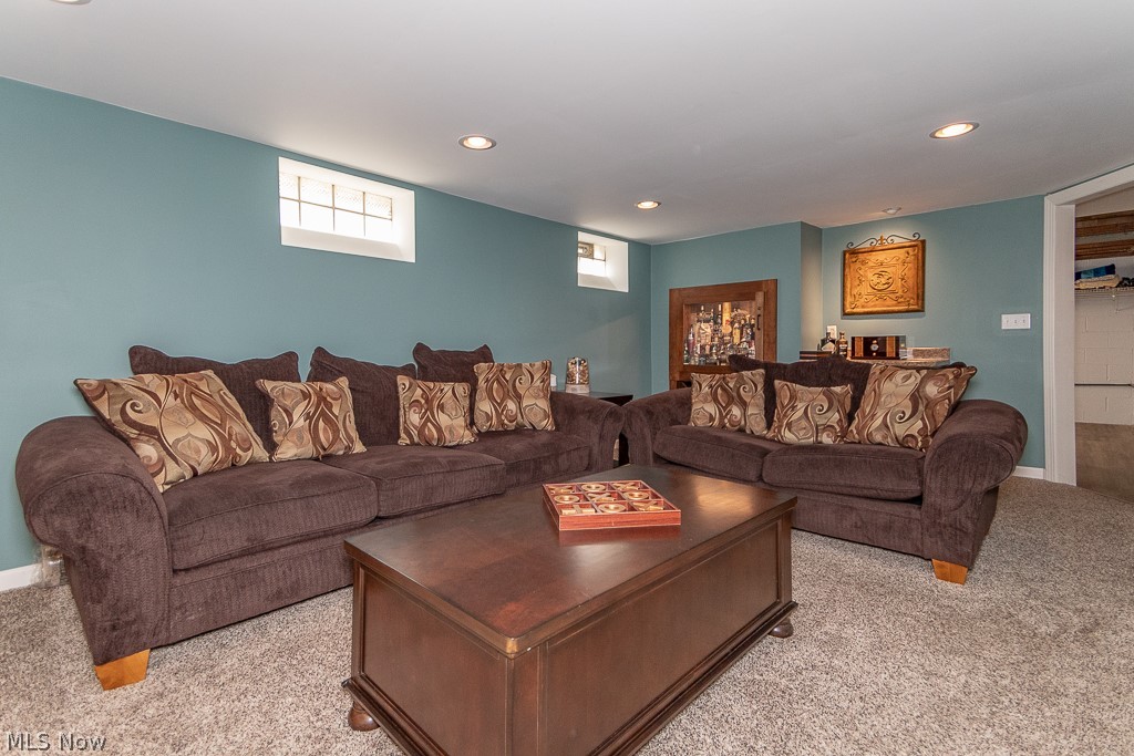 697 Glenhurst Road Willowick, OH 44095 - Photo 19 of 27 Lower Level Family with newer carpet and beverage center
