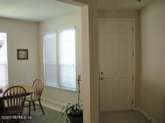 46 Molasses Court Fruit Cove, FL 32259 - Photo 5 of 17 a dining room with furniture and window