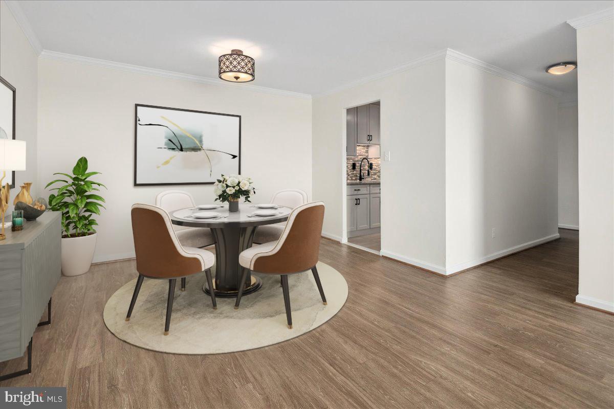 9701 Fields Road, Unit 1408 Gaithersburg, MD 20878 - Photo 14 of 29 a dining room with furniture and wooden floor