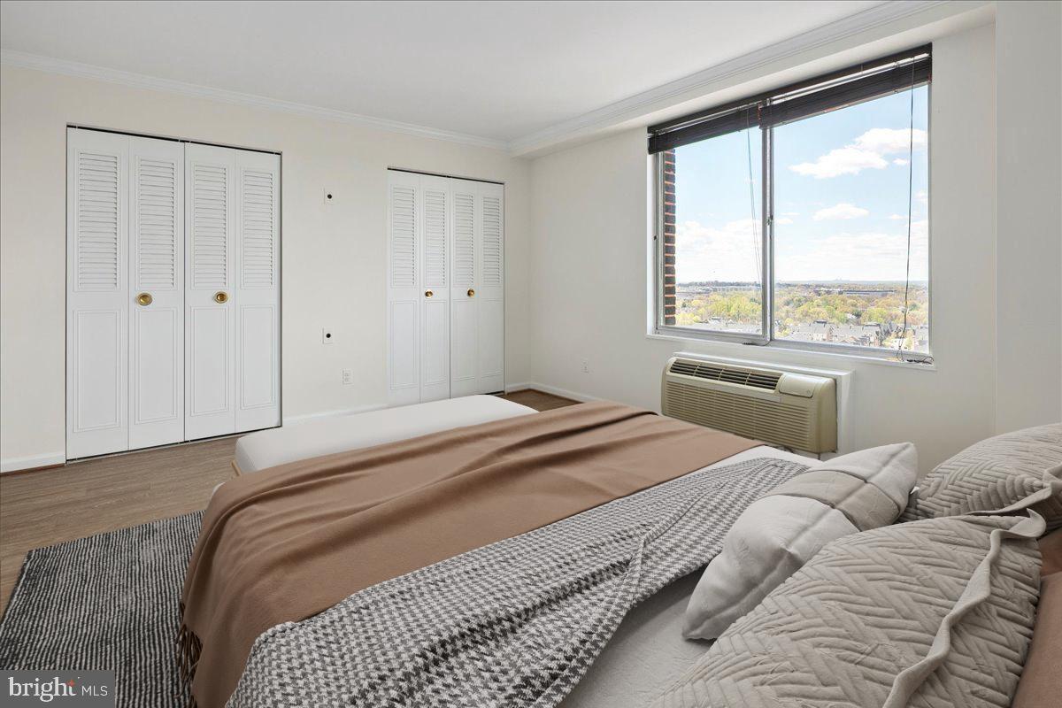 9701 Fields Road, Unit 1408 Gaithersburg, MD 20878 - Photo 23 of 29 a bedroom with a bed and a window