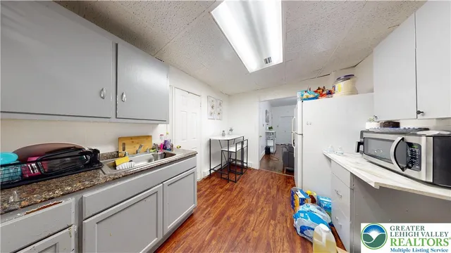 a view of living room with furniture and a window
