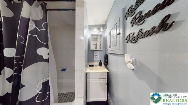 a view of a room with wooden floor and closet