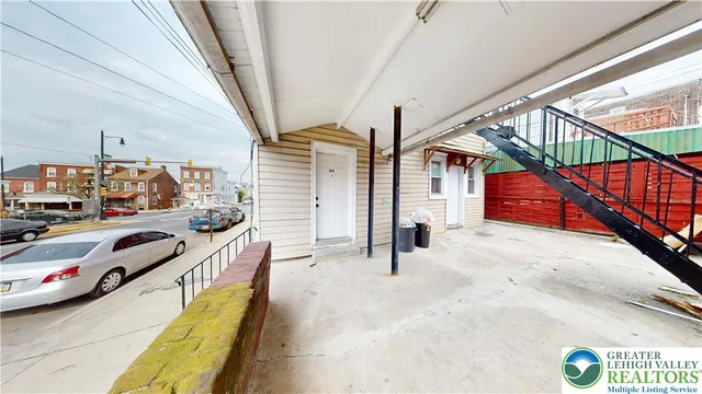 a view of car parked in front of building