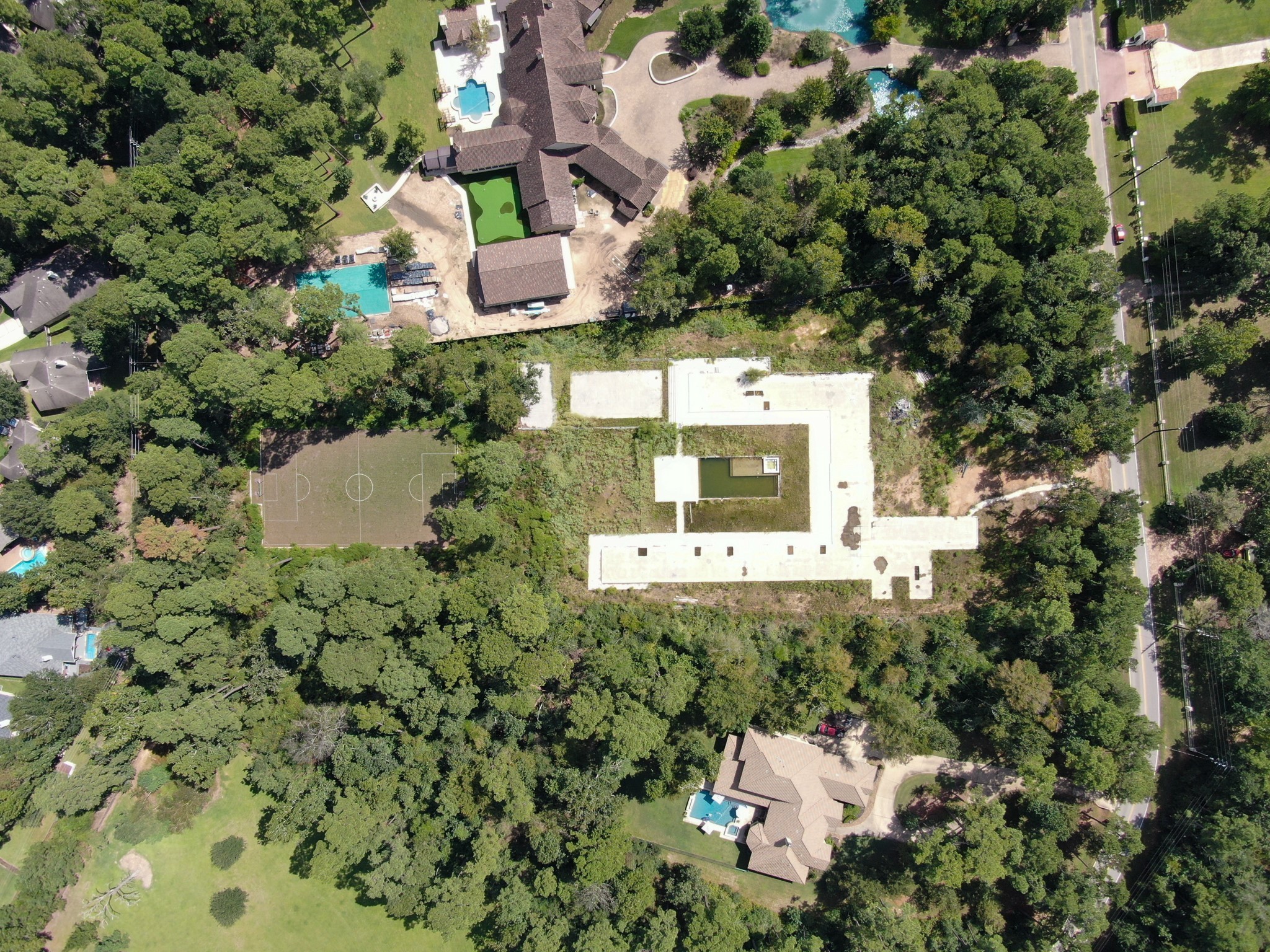 7588 Red Bay Circle Magnolia, TX 77354 - Photo 11 of 13 an aerial view of a house with a yard and garden