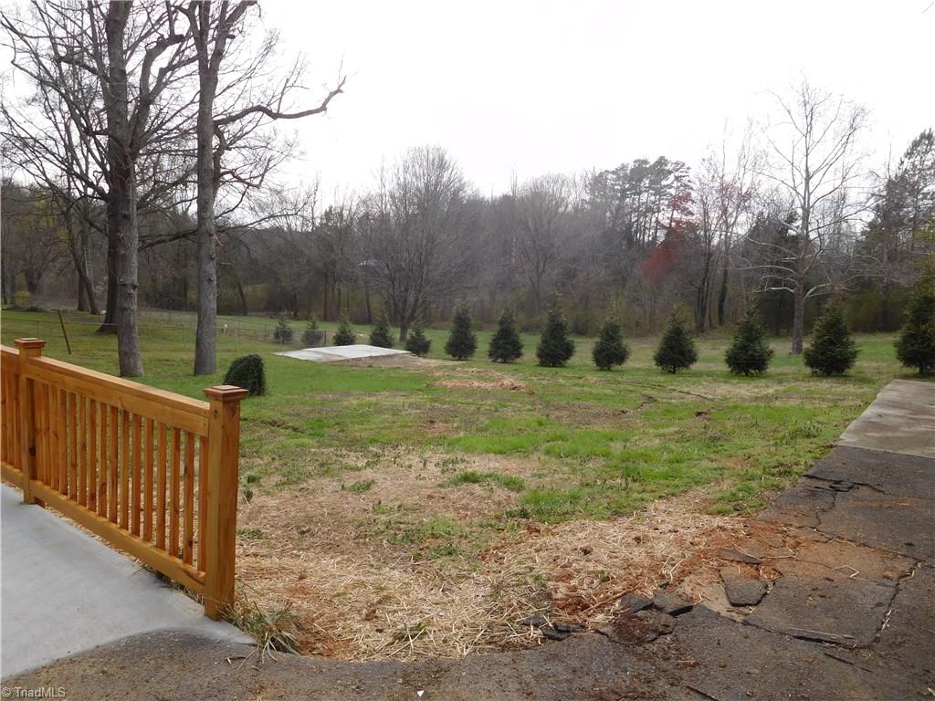 144 Hauser Road Lewisville, NC 27023 - Photo 17 of 21 Concrete Slab in yard perfect for placing a storage building on.