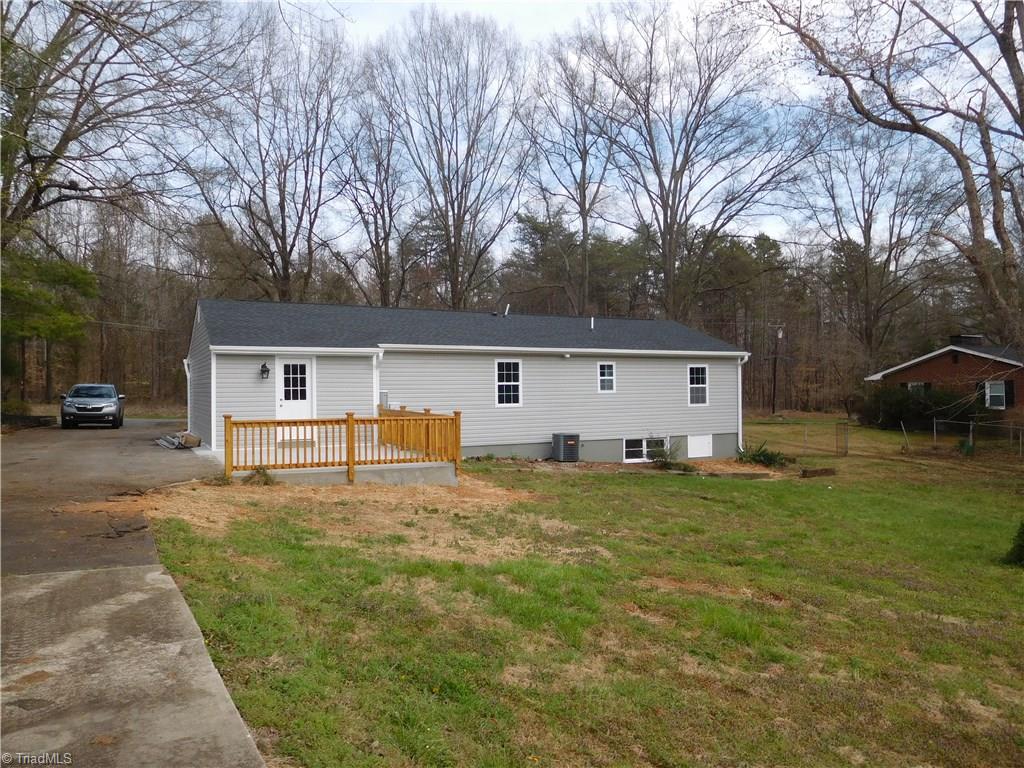 144 Hauser Road Lewisville, NC 27023 - Photo 20 of 21 Back of home. Long paved driveway.
