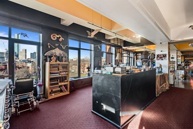 a living room with gym equipment