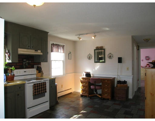 46 Crest Road Monson, MA 01057 - Photo 8 of 17 a kitchen with a sink cabinets and window