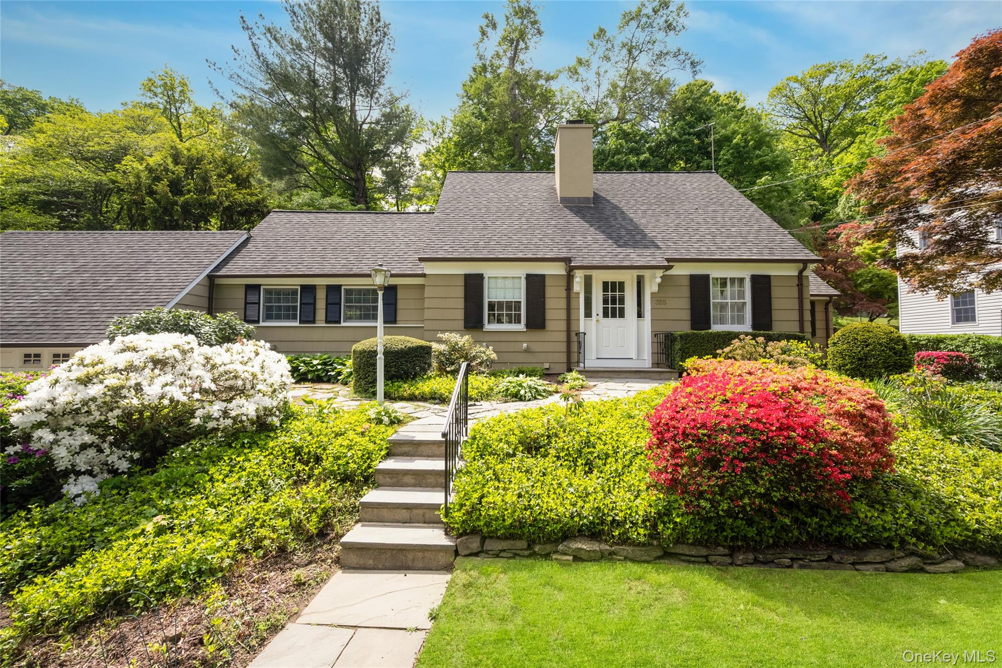 355 Sprain Road Yonkers, NY 10710 - Photo 1 of 1 View of front facade with a chimney and roof with shingles