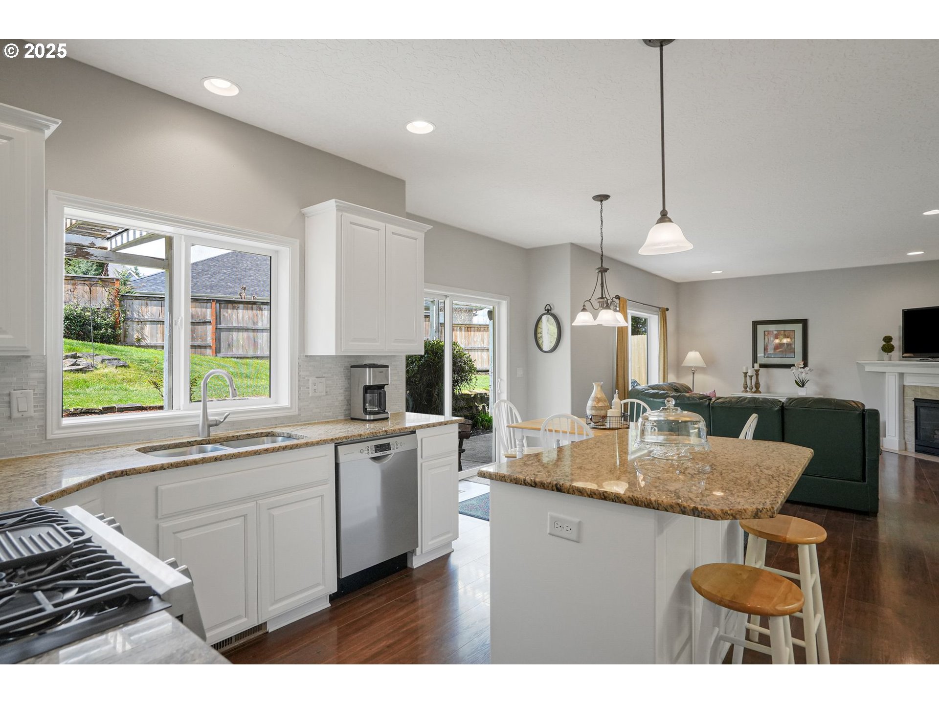 1832 Northwest Olivia Circle Albany, OR 97321 - Photo 15 of 48 a kitchen with center island table and chairs