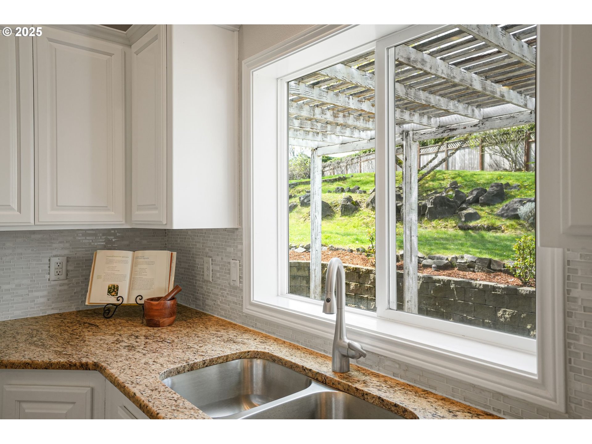 1832 Northwest Olivia Circle Albany, OR 97321 - Photo 18 of 48 a kitchen with granite countertop a sink and a window