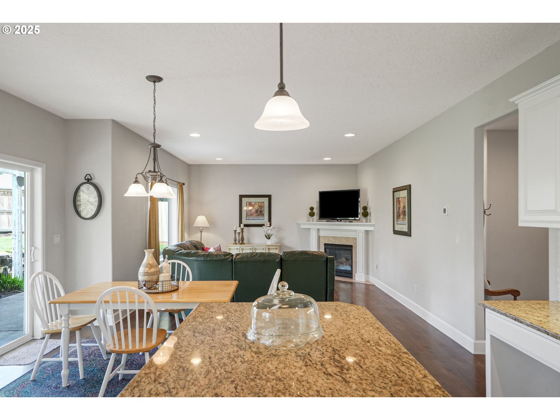 1832 Northwest Olivia Circle Albany, OR 97321 - Photo 19 of 48 a living room with furniture a window and a flat screen tv