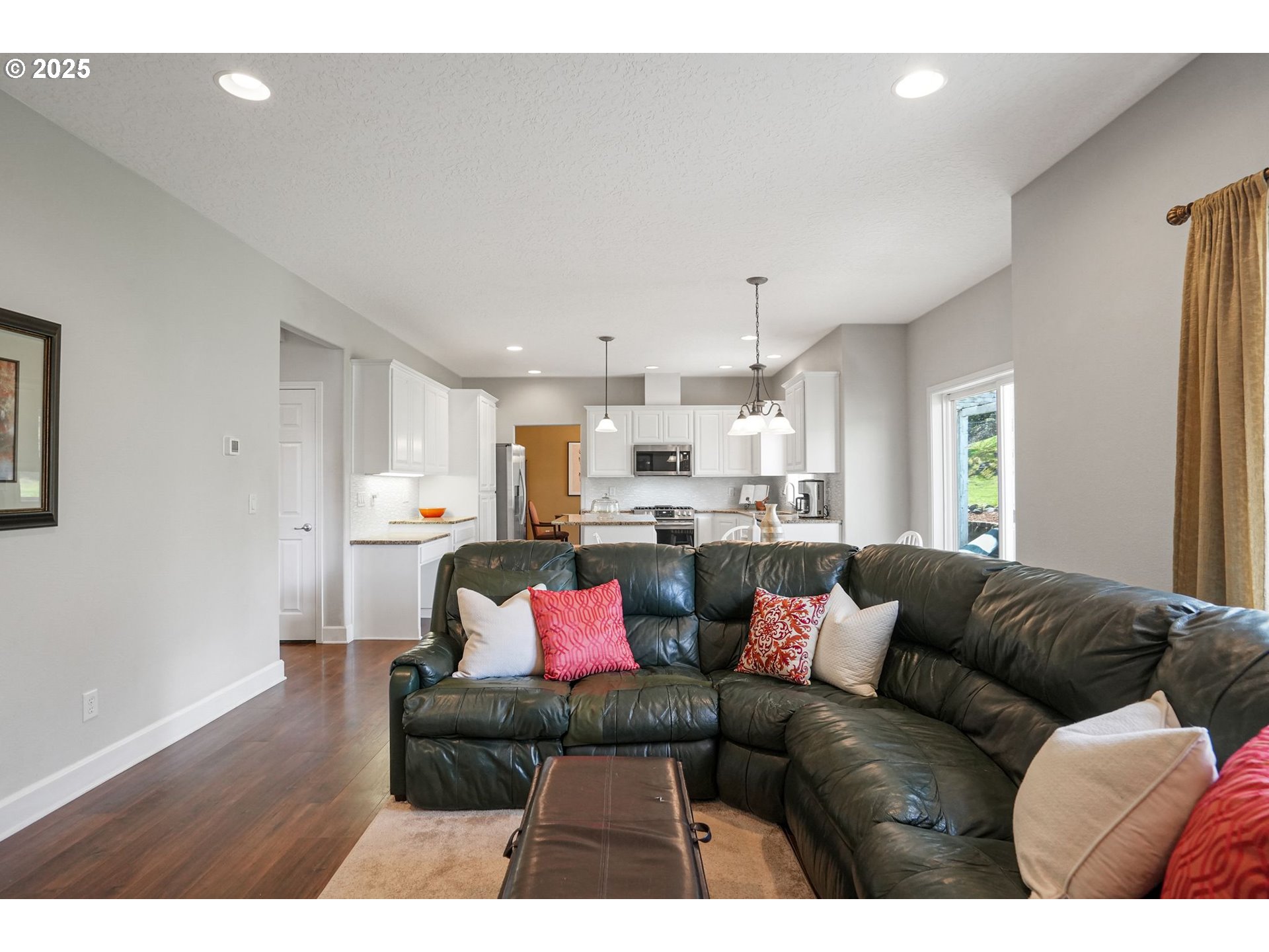 1832 Northwest Olivia Circle Albany, OR 97321 - Photo 26 of 48 a living room with furniture and kitchen view