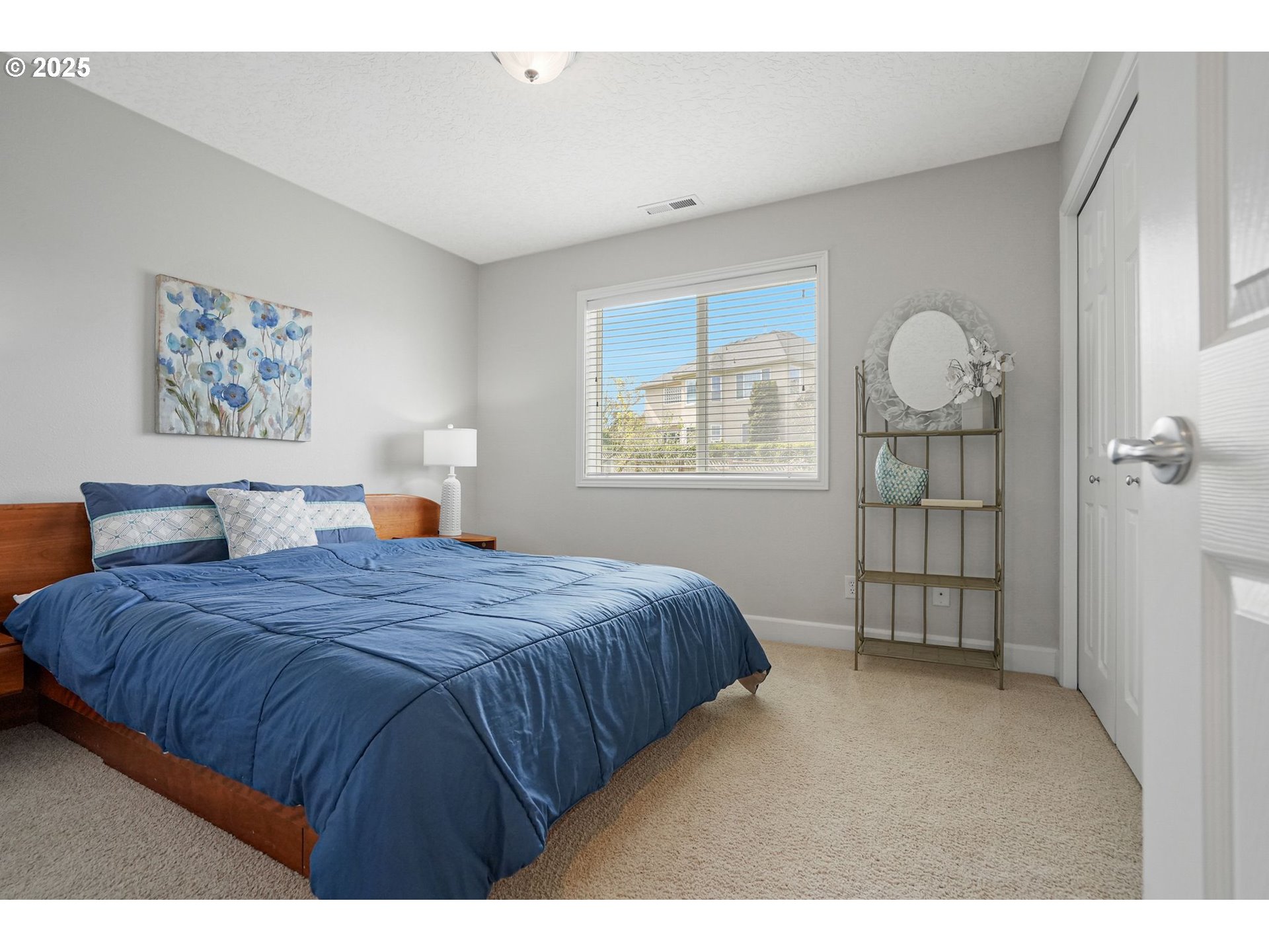 1832 Northwest Olivia Circle Albany, OR 97321 - Photo 37 of 48 a bedroom with a bed and a window