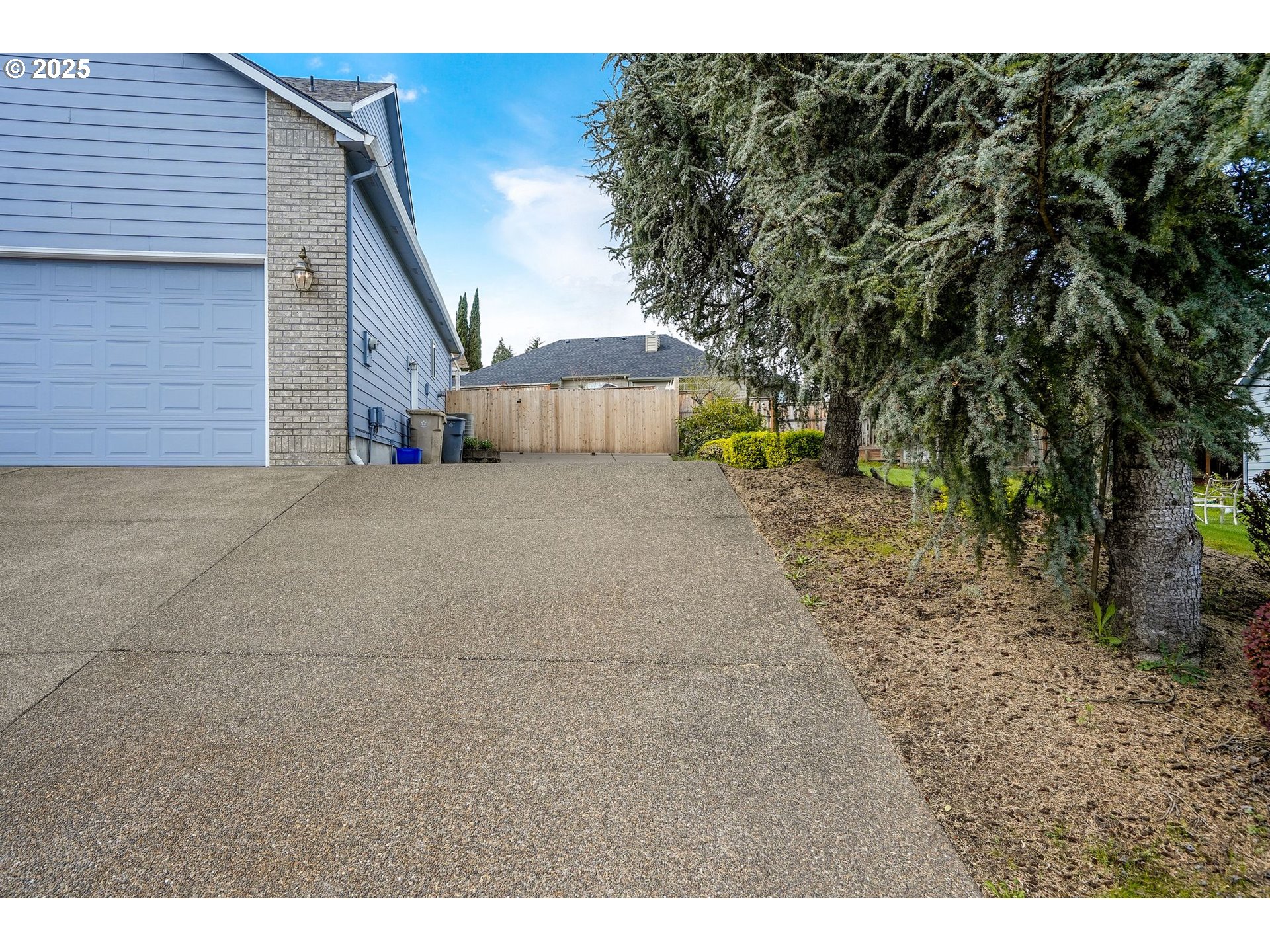 1832 Northwest Olivia Circle Albany, OR 97321 - Photo 4 of 48 a view of a house with a yard and tree