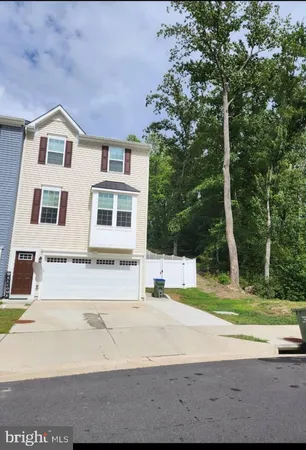 a view of a building with a yard