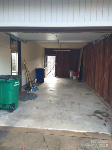 a kitchen with a cabinets and chair
