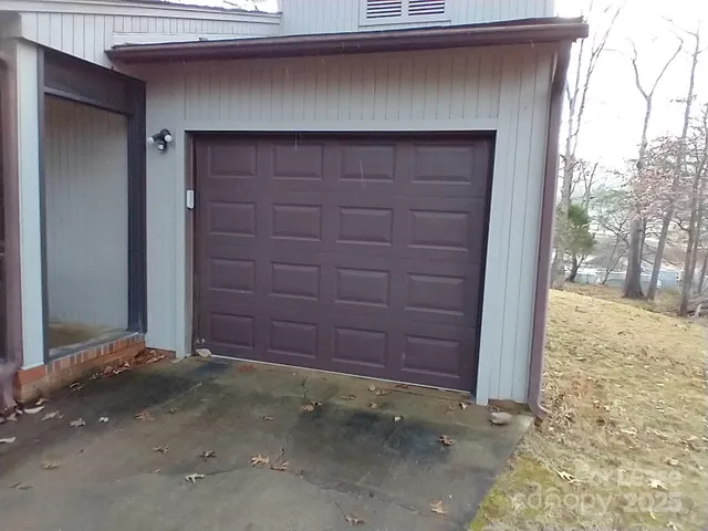 a wooden door in front of a house