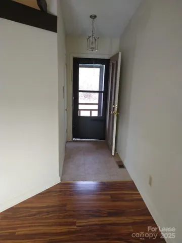 a view of livingroom with hardwood floor and window