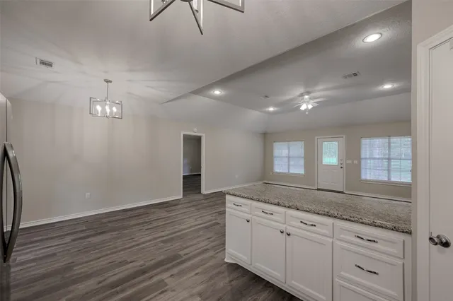 a view of a kitchen and a sink