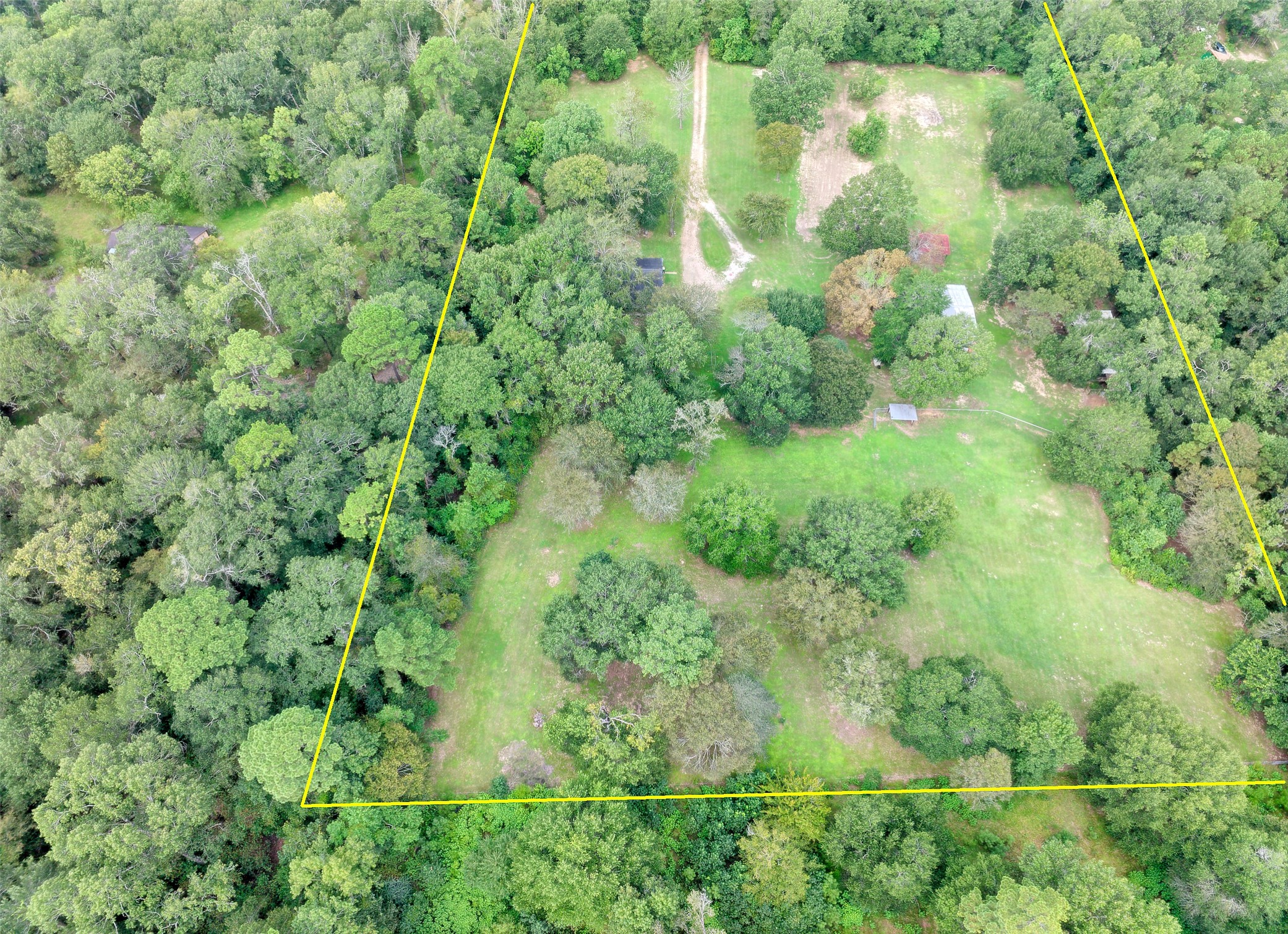3131 Sapp Road Conroe, TX 77304 - Photo 29 of 48 an aerial view of residential house with outdoor space and trees all around