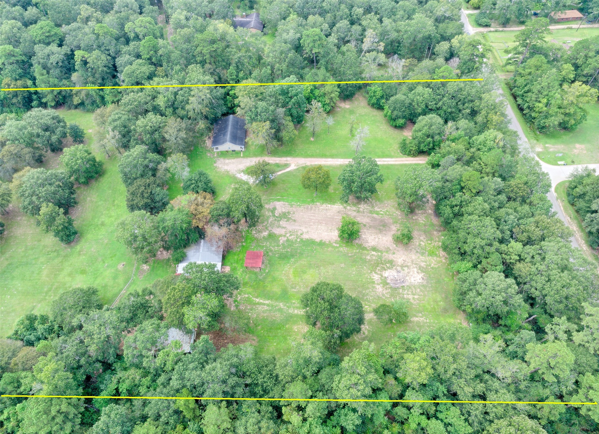 3131 Sapp Road Conroe, TX 77304 - Photo 30 of 48 an aerial view of residential houses with outdoor space and trees