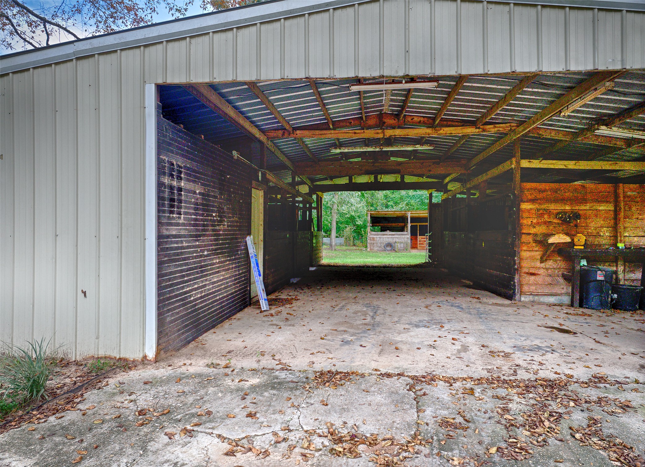 3131 Sapp Road Conroe, TX 77304 - Photo 32 of 48 a view of backyard with barbeque grill and wooden fence