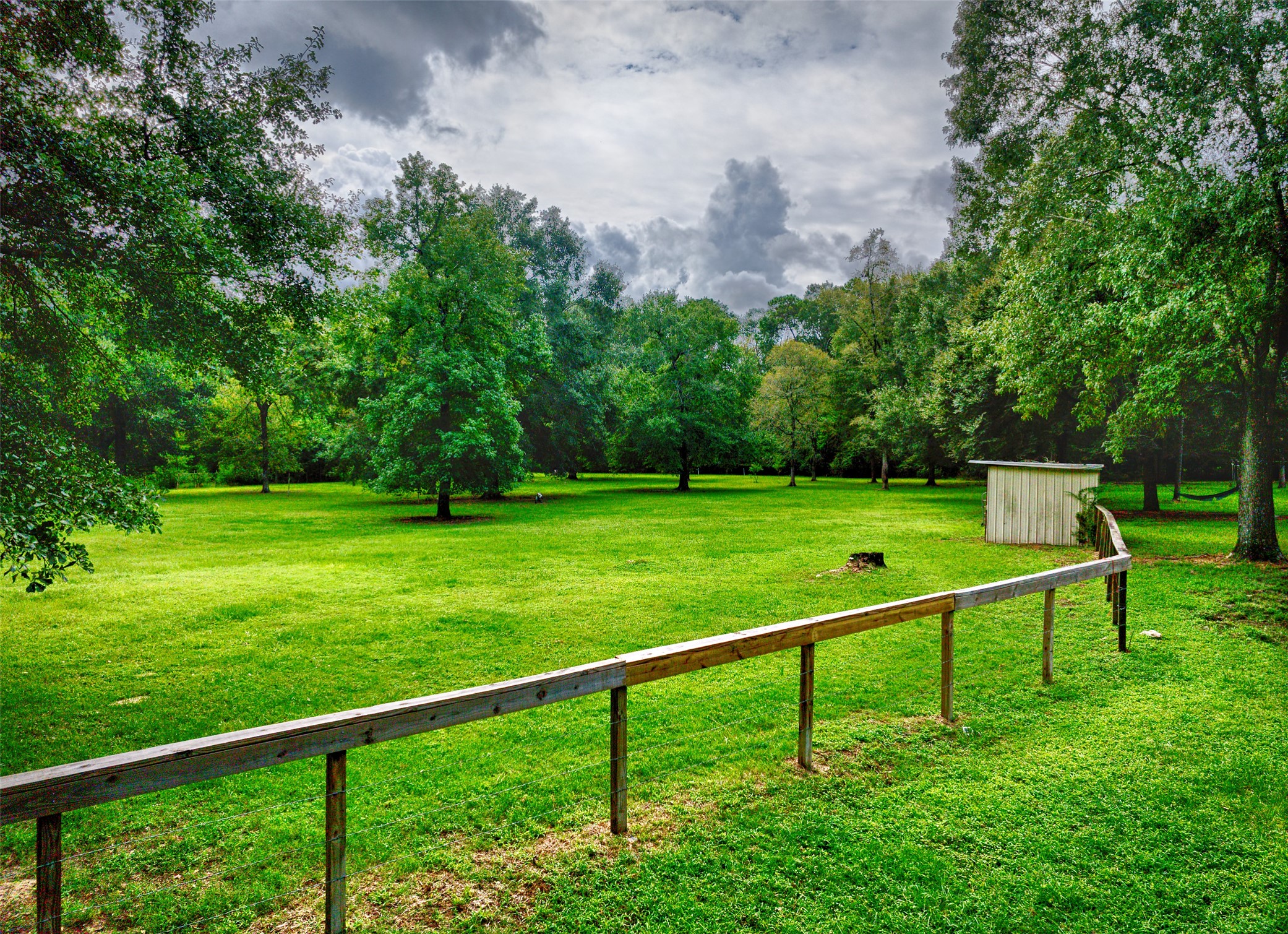 3131 Sapp Road Conroe, TX 77304 - Photo 5 of 48 a view of a bench in a garden