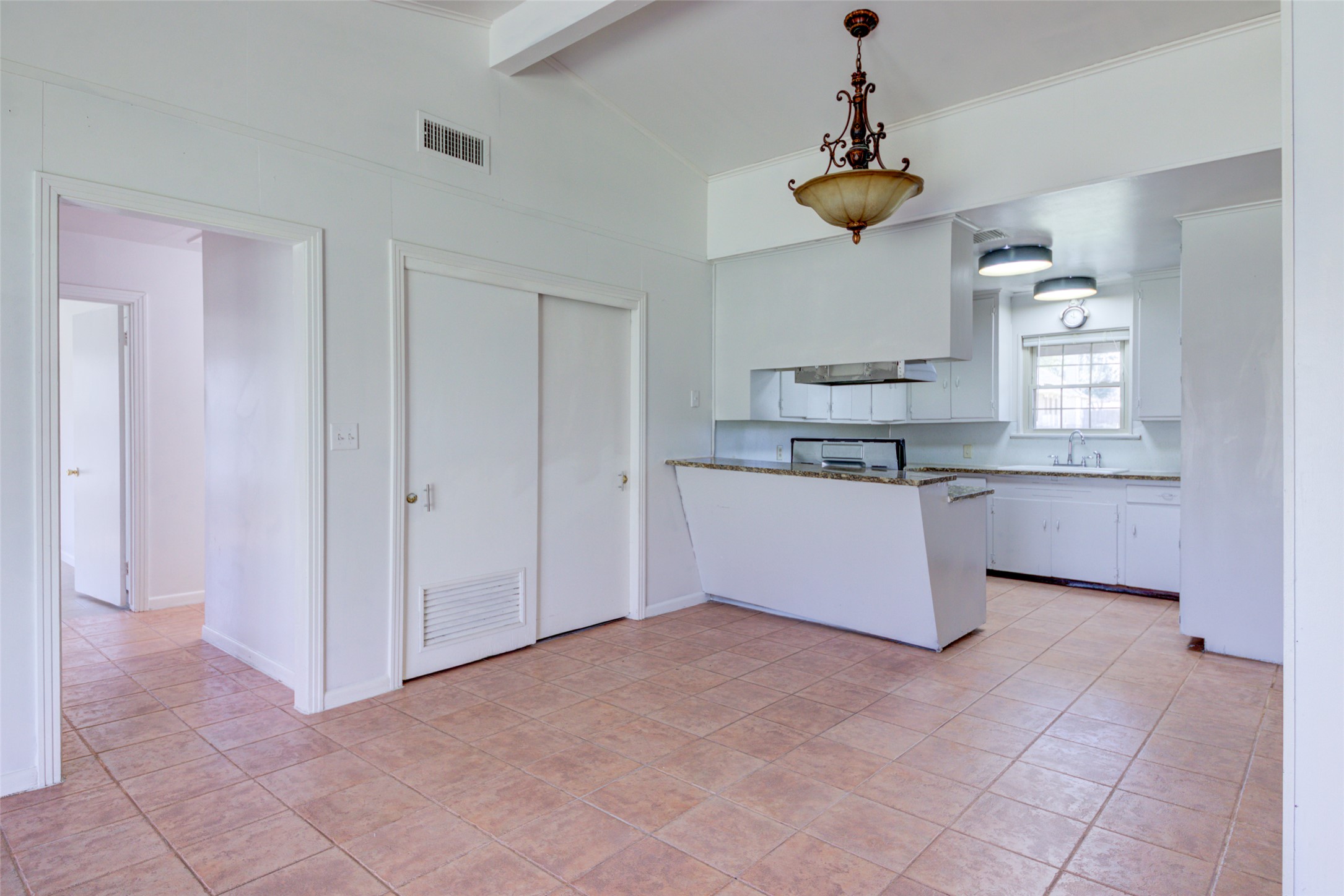 11811 Sleepy Hollow Road Manchaca, TX 78652 - Photo 8 of 35 a kitchen with stainless steel appliances granite countertop a sink and a refrigerator