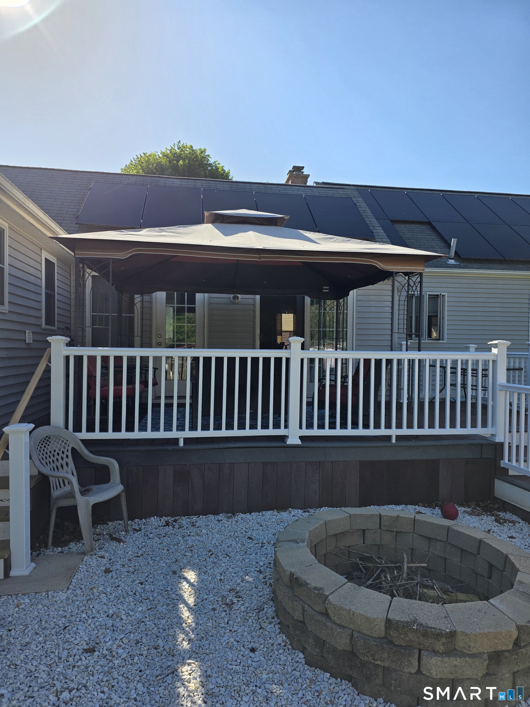 15 Van Buren Road Enfield, CT 06082 - Photo 13 of 40 a view of a chair and table in the deck