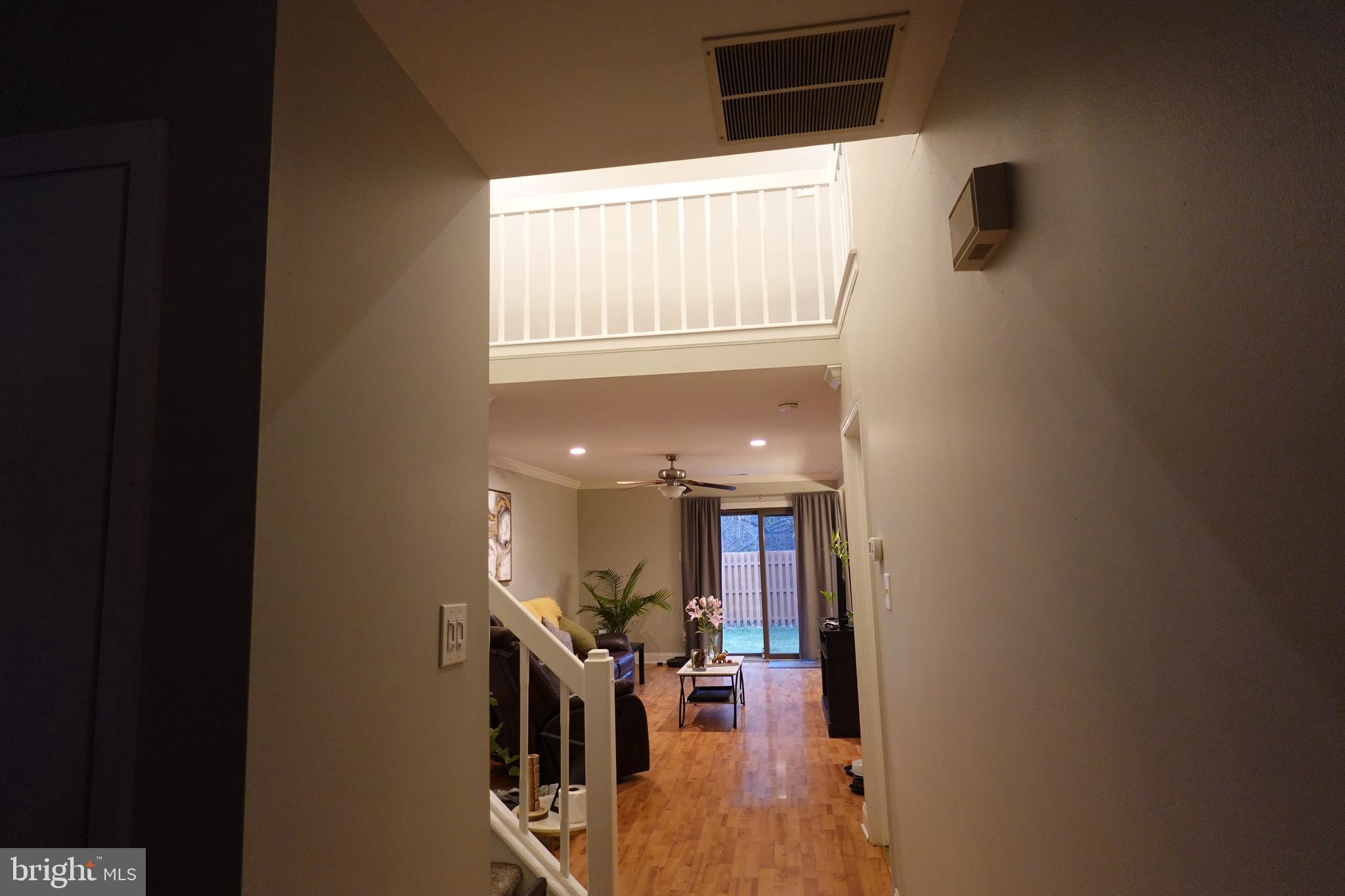 106 Five Crown Royal Marlton, NJ 08053 - Photo 12 of 27 a view of a hallway with furniture and a window
