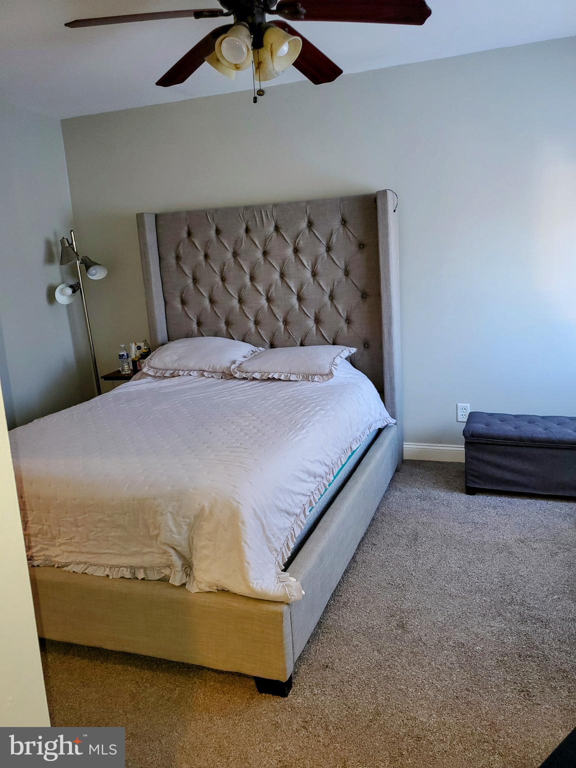 106 Five Crown Royal Marlton, NJ 08053 - Photo 18 of 27 a bed sitting in a bedroom next to a cabinet