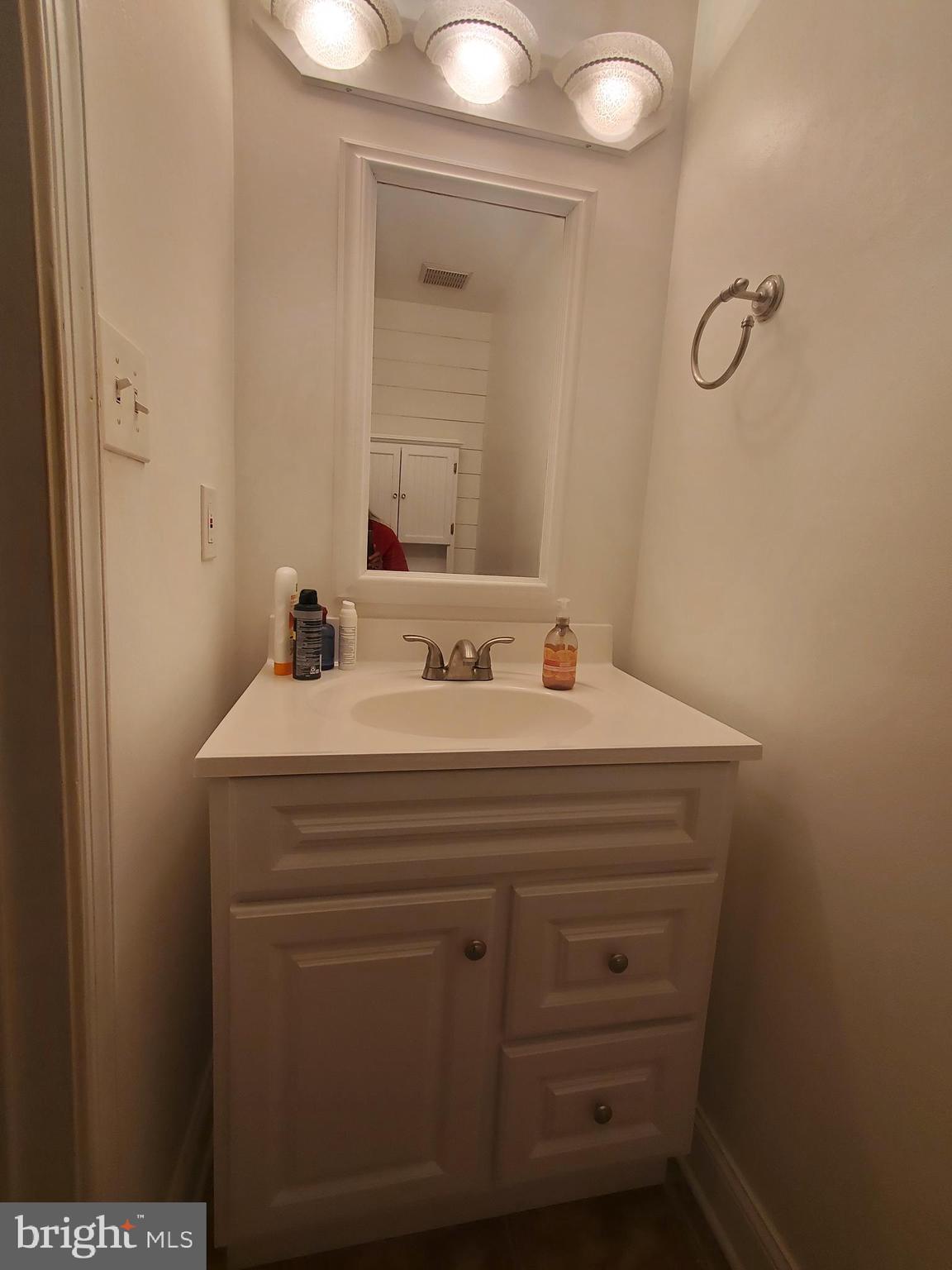 106 Five Crown Royal Marlton, NJ 08053 - Photo 10 of 27 a bathroom with a sink and a mirror