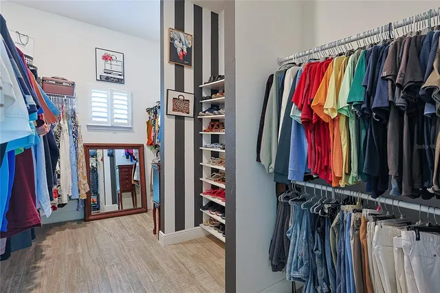 a view of a patio with a table and chairs