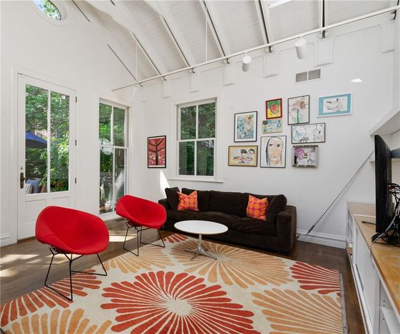 a bathroom with a toilet sink and shower