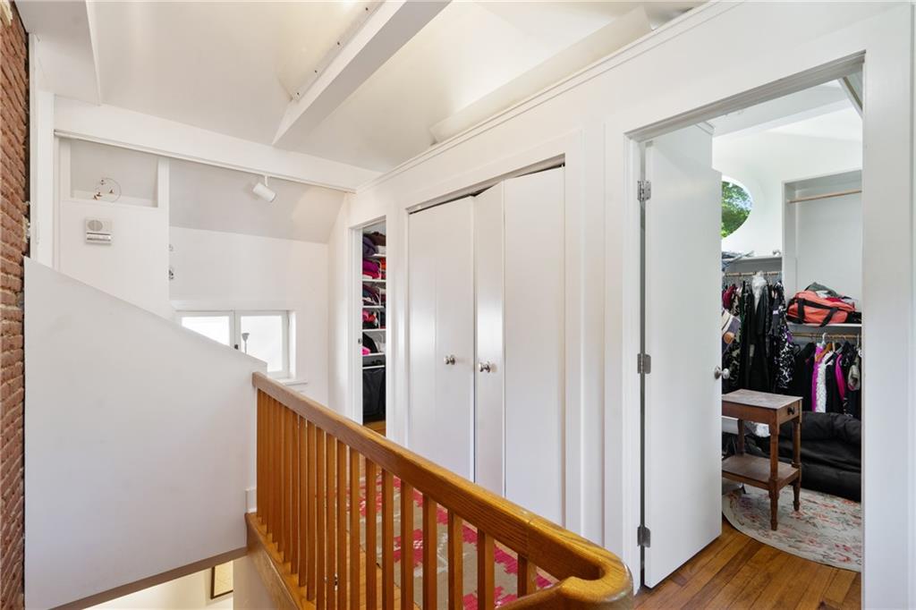 5306 Westminster Place Pittsburgh, PA 15232 - Photo 26 of 50 a view of a hallway with a dining room and wooden floor