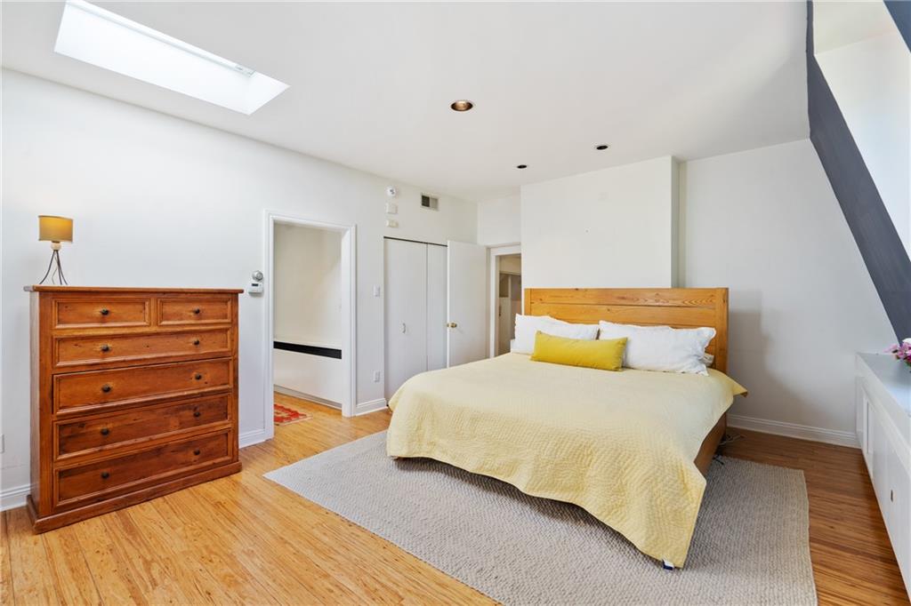 5306 Westminster Place Pittsburgh, PA 15232 - Photo 28 of 50 a bedroom with a bed and closet