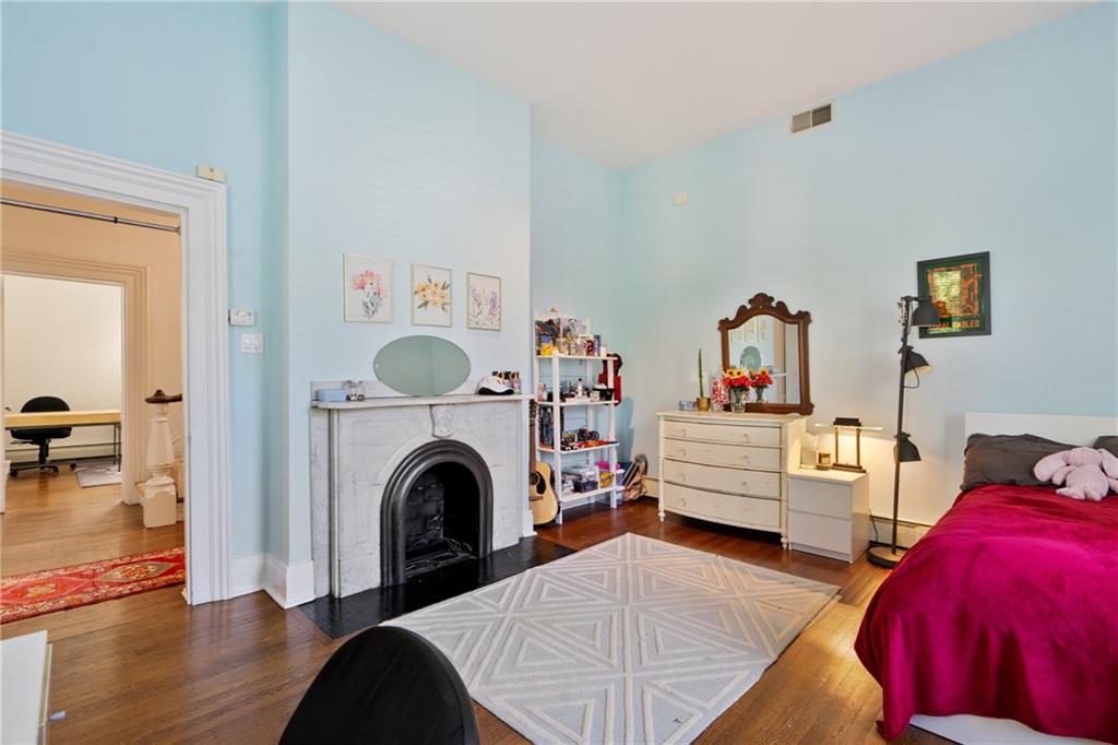 5306 Westminster Place Pittsburgh, PA 15232 - Photo 32 of 50 a living room with furniture and a fireplace