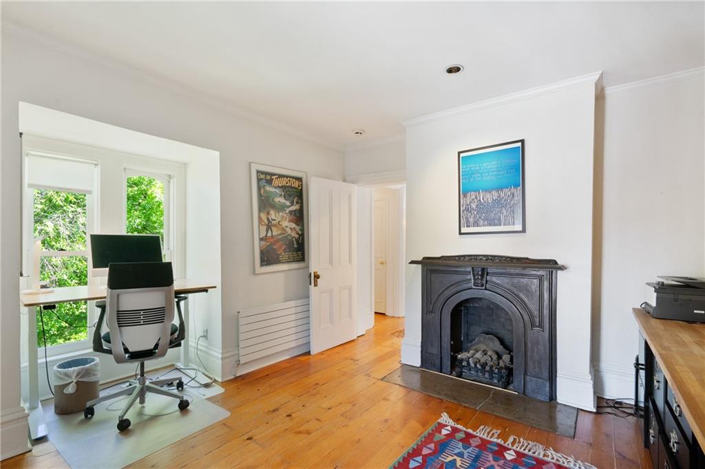 5306 Westminster Place Pittsburgh, PA 15232 - Photo 38 of 50 a view of livingroom with workspace and a fireplace