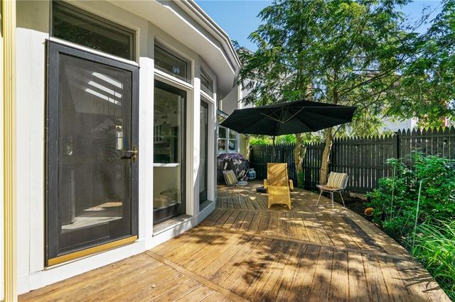 a view of backyard with patio