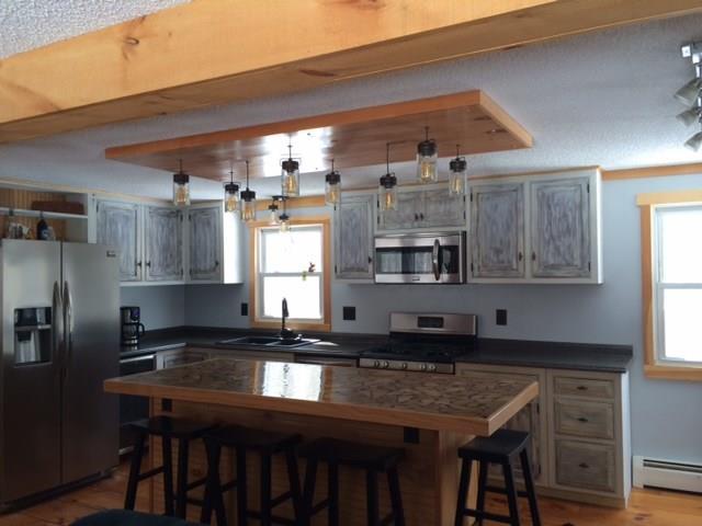 182 Peter Vier Road Durham, ME 04222 - Photo 6 of 19 The kitchen in all of its glory. Do...