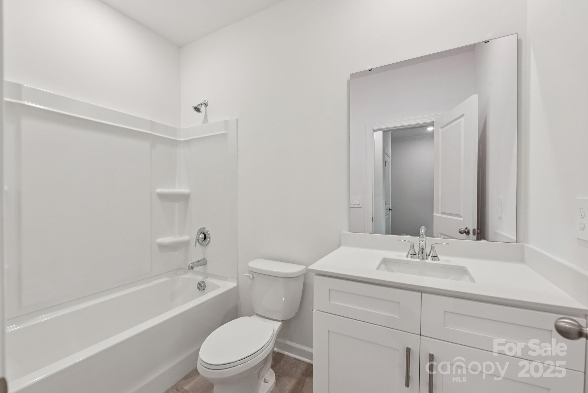 712 Palmer Pendleton Way York, SC 29745 - Photo 13 of 36 a bathroom with a sink a toilet and a bathtub